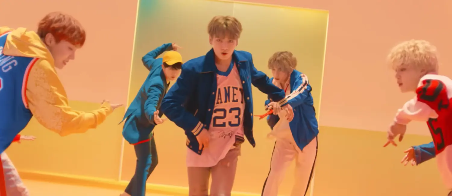 Jungkook wearing signed Michael Jordan Laney High School jersey