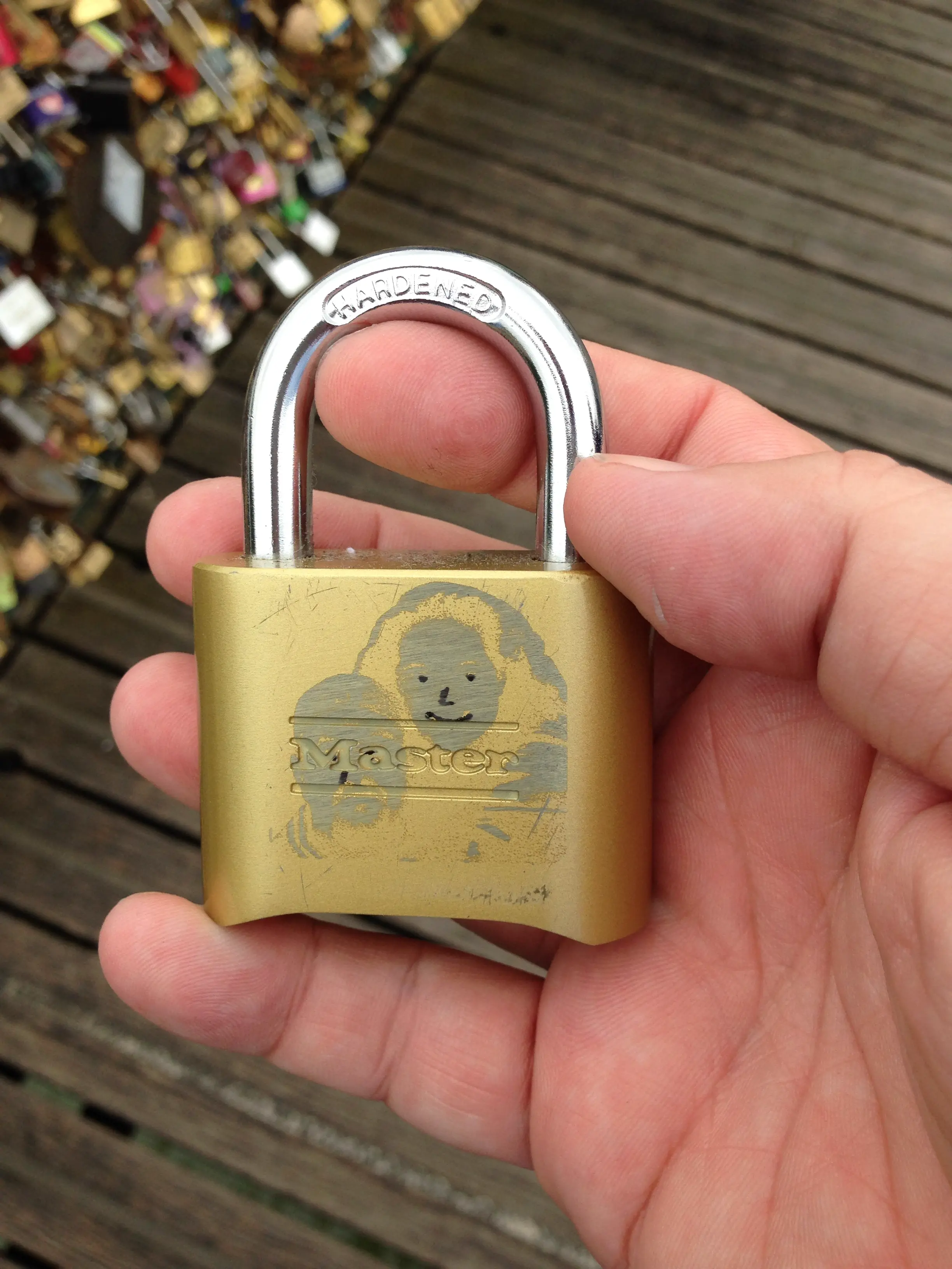 The actual lock with rough laser engraving